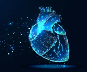 Vector of a blue heart surrounded by sparkles 
