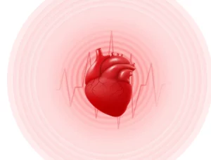 Vector of a red heart against a pink backdrop with a heart rhythm 