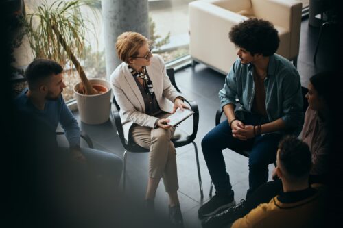 above-view-of-counseling-during-group-therapy-at-m-2023-11-27-05-35-32-utc