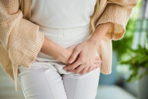 Healthcare,Concept,Image,,Asian,Woman,Holding,Her,Pee,,Health,Care